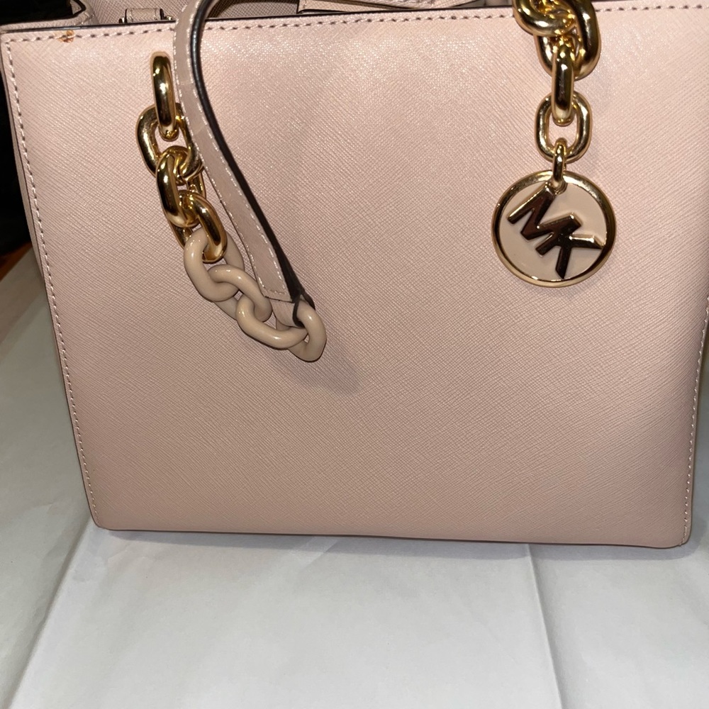 authentic light pink michael kors hand bag